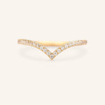 A V-shaped diamond ring with a solid gold band, set with sparkling diamonds.