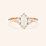 Rose gold Cassidy marquise opal and trillion diamond engagement ring front view on white background