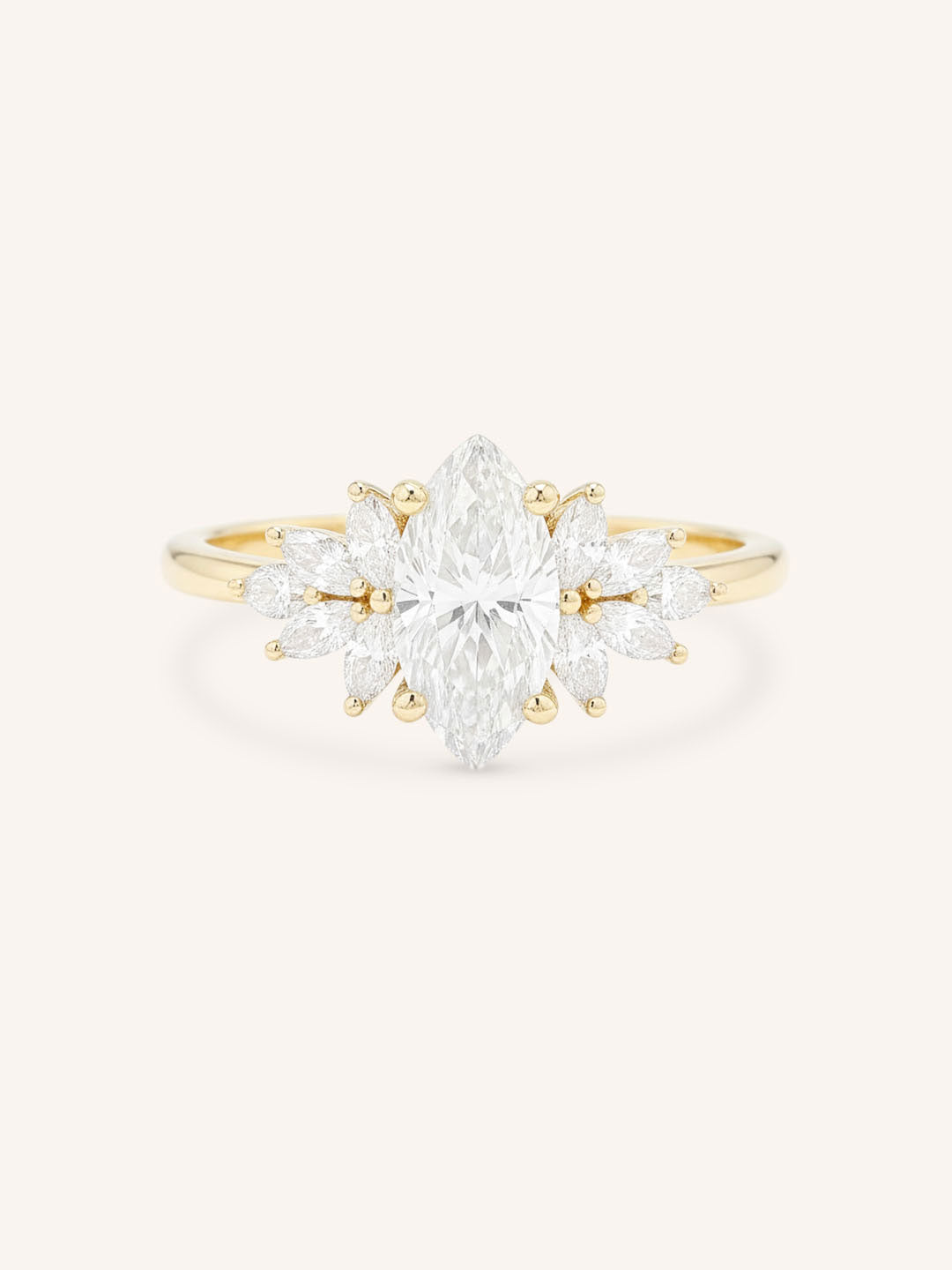 Yellow gold Emme marquise diamond cluster engagement ring front view on white background