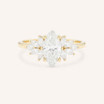 Yellow gold Emme marquise diamond cluster engagement ring front view on white background