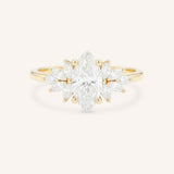 Yellow gold Emme marquise diamond cluster engagement ring front view on white background
