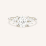 White gold Emme oval diamond cluster engagement ring front view on white background