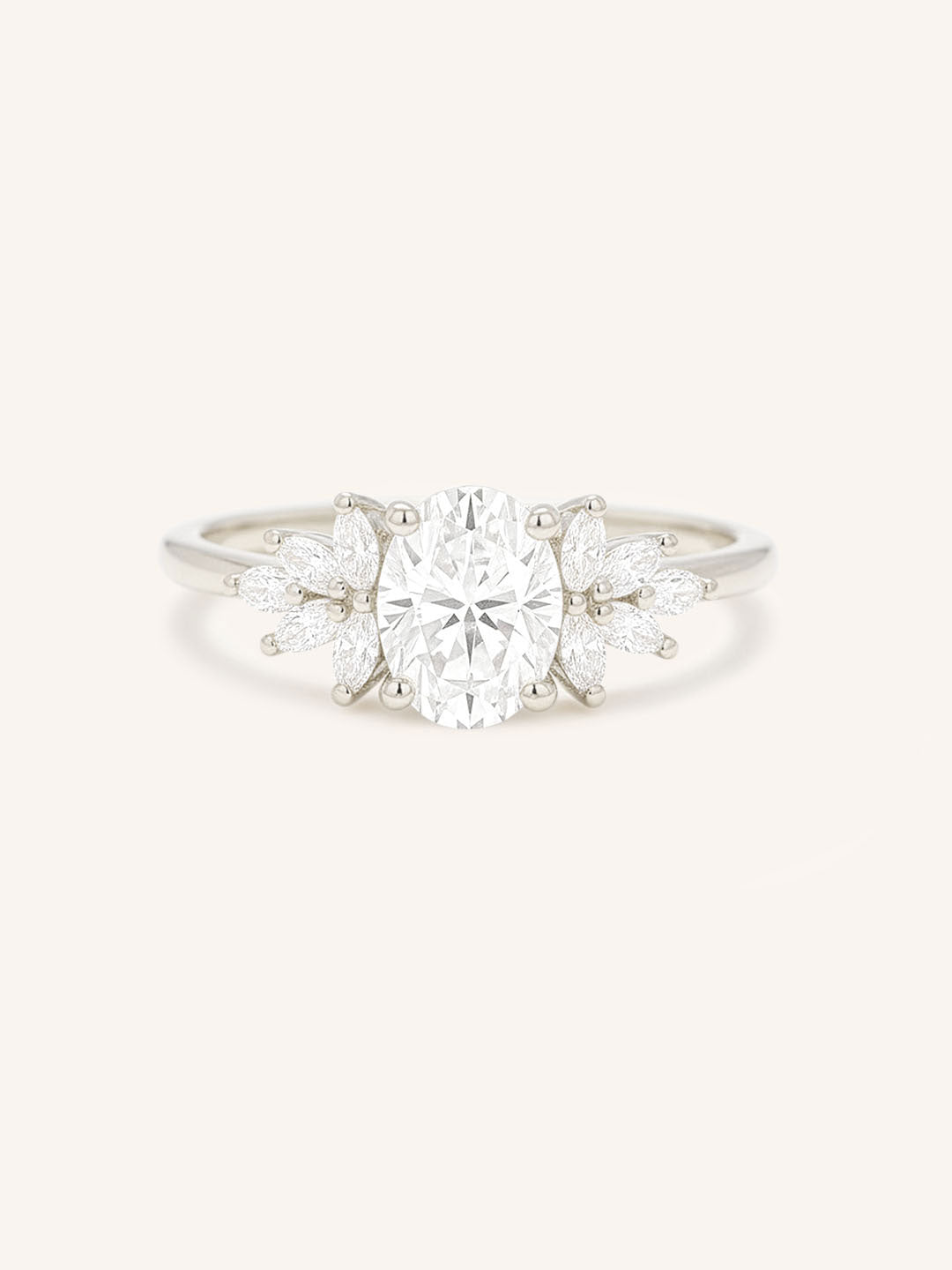 White gold Emme oval diamond cluster engagement ring front view on white background