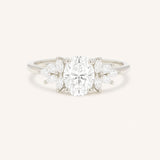 White gold Emme oval diamond cluster engagement ring front view on white background