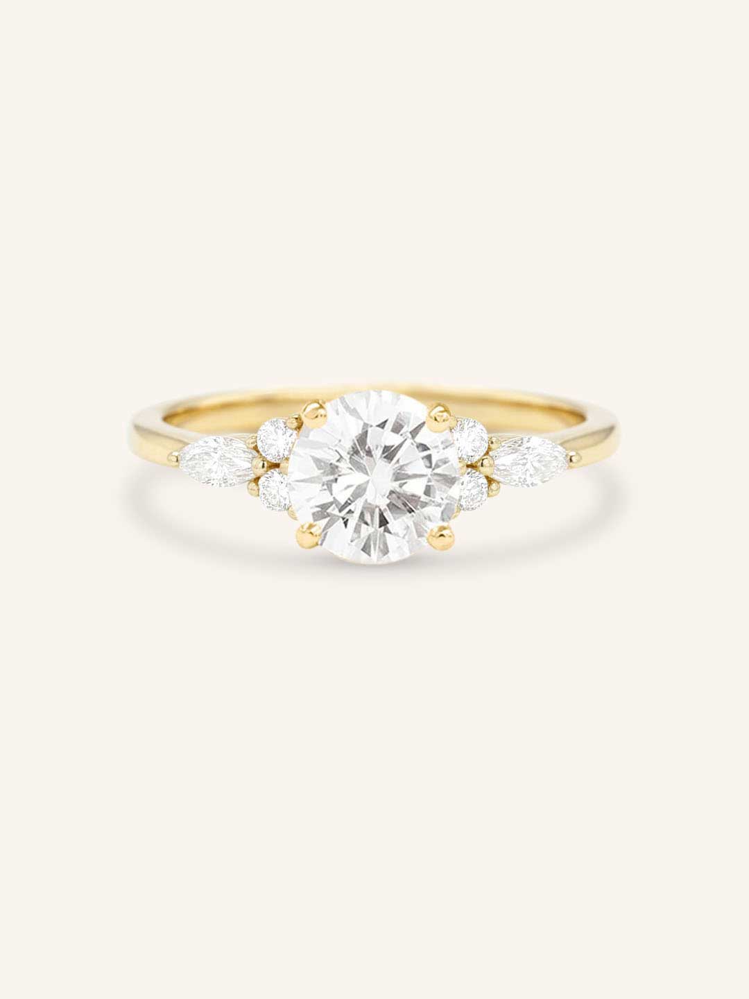 Yellow gold Nalani round diamond engagement ring front view on white background