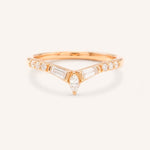 Rose gold Kurtia curved diamond wedding band front view on white background
