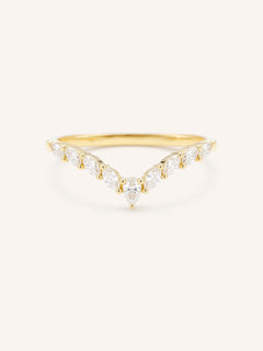 Curved Gold ring with diamonds on a white background