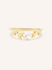 Yellow gold Rudina leaf curved diamond ring front view on white background