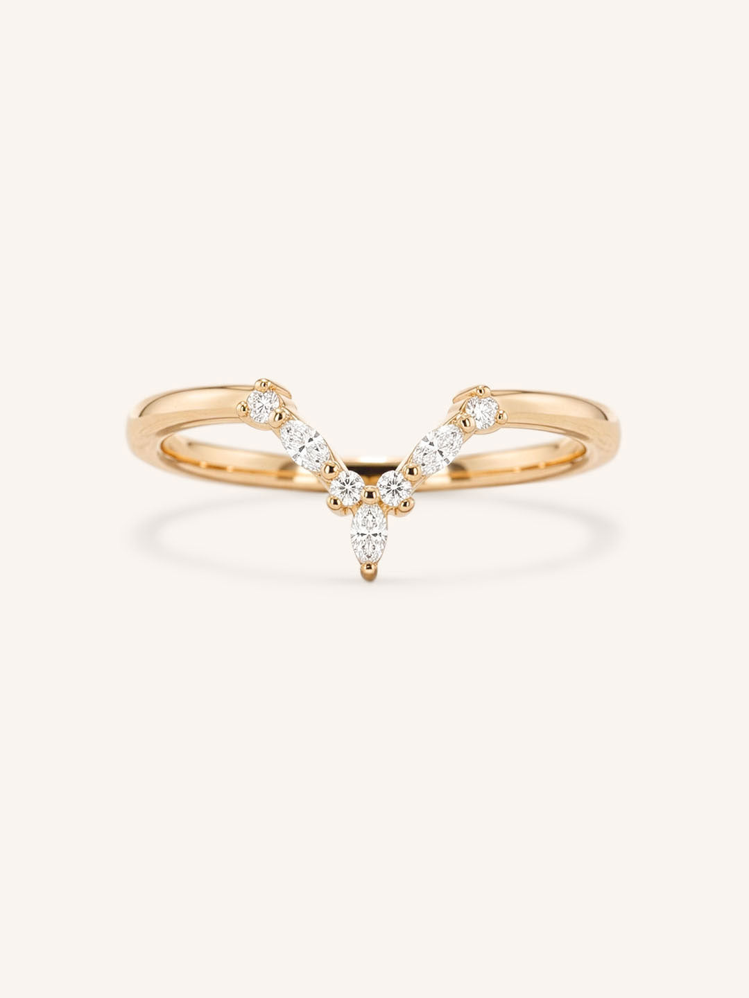 Rose gold curved diamond wedding band with V-shaped pave setting, front view, on white background