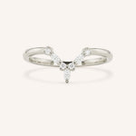 White gold curved diamond wedding band with V-shaped pave design on white background