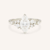 White Gold Elestren Marquise Cut Cluster Diamond Engagement Ring front view on white background