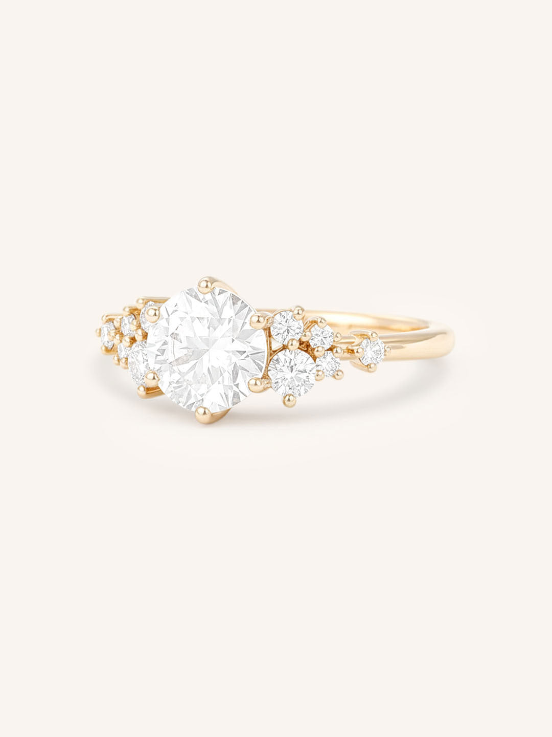 Gold ring with a diamond on a white background
