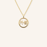 Yellow gold WaiPo grandma necklace with Chinese characters in circular pendant on white background
