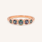 Rose gold Bonneau five stone alexandrite bezel ring front view on white background