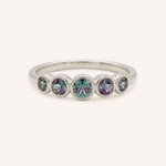 White gold Bonneau five stone alexandrite bezel ring front view on white background