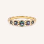 Yellow gold Bonneau five stone alexandrite bezel ring front view on white background