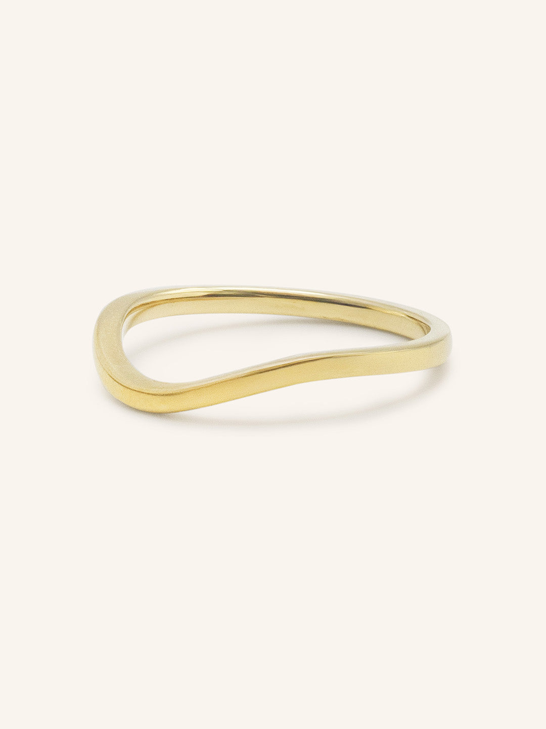Yellow gold Sylvan curved nesting ring side view on white background