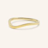 Yellow gold Sylvan curved nesting ring side view on white background