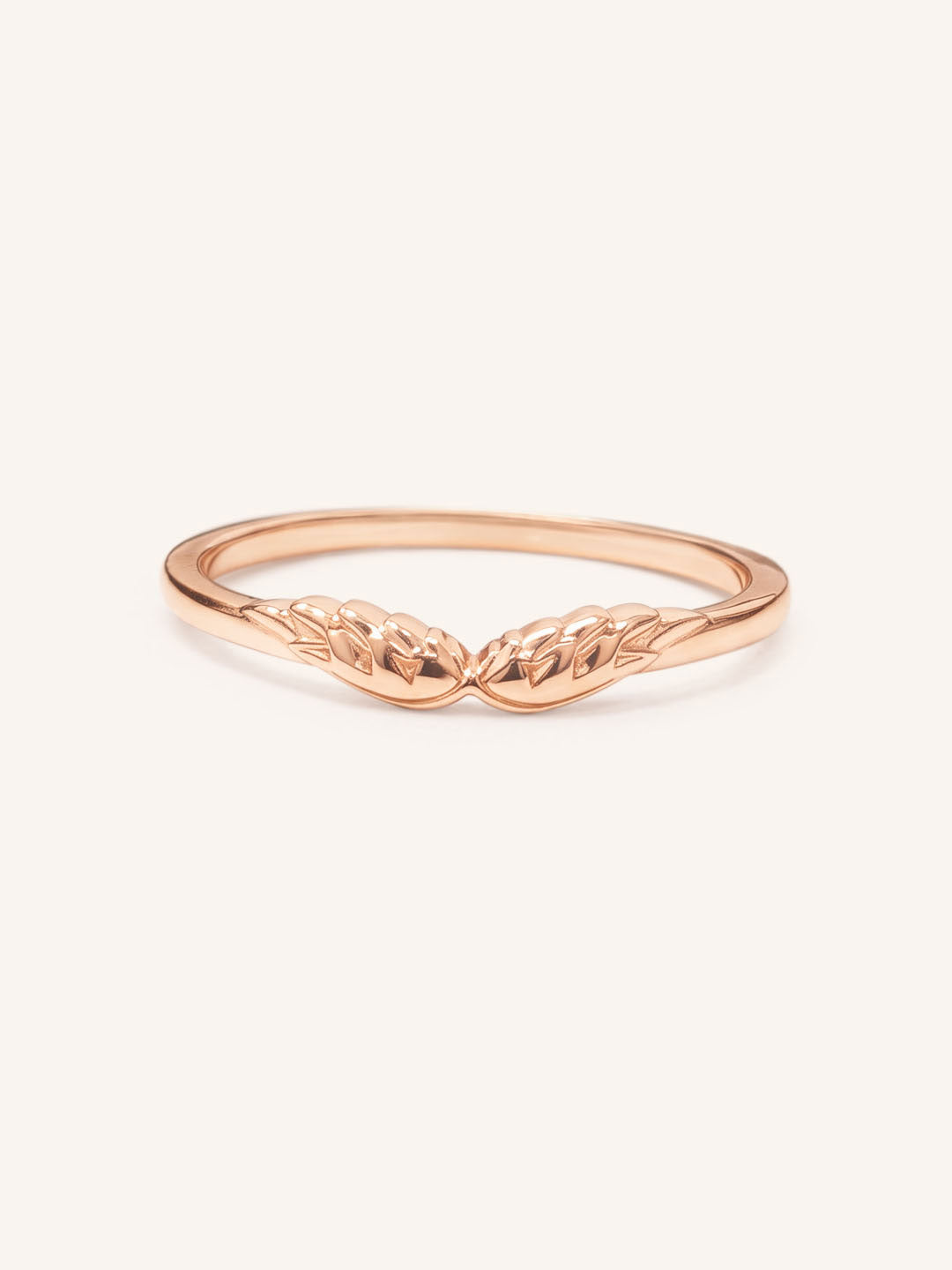 Rose gold Addison angel wings stackable ring, front view, on white background