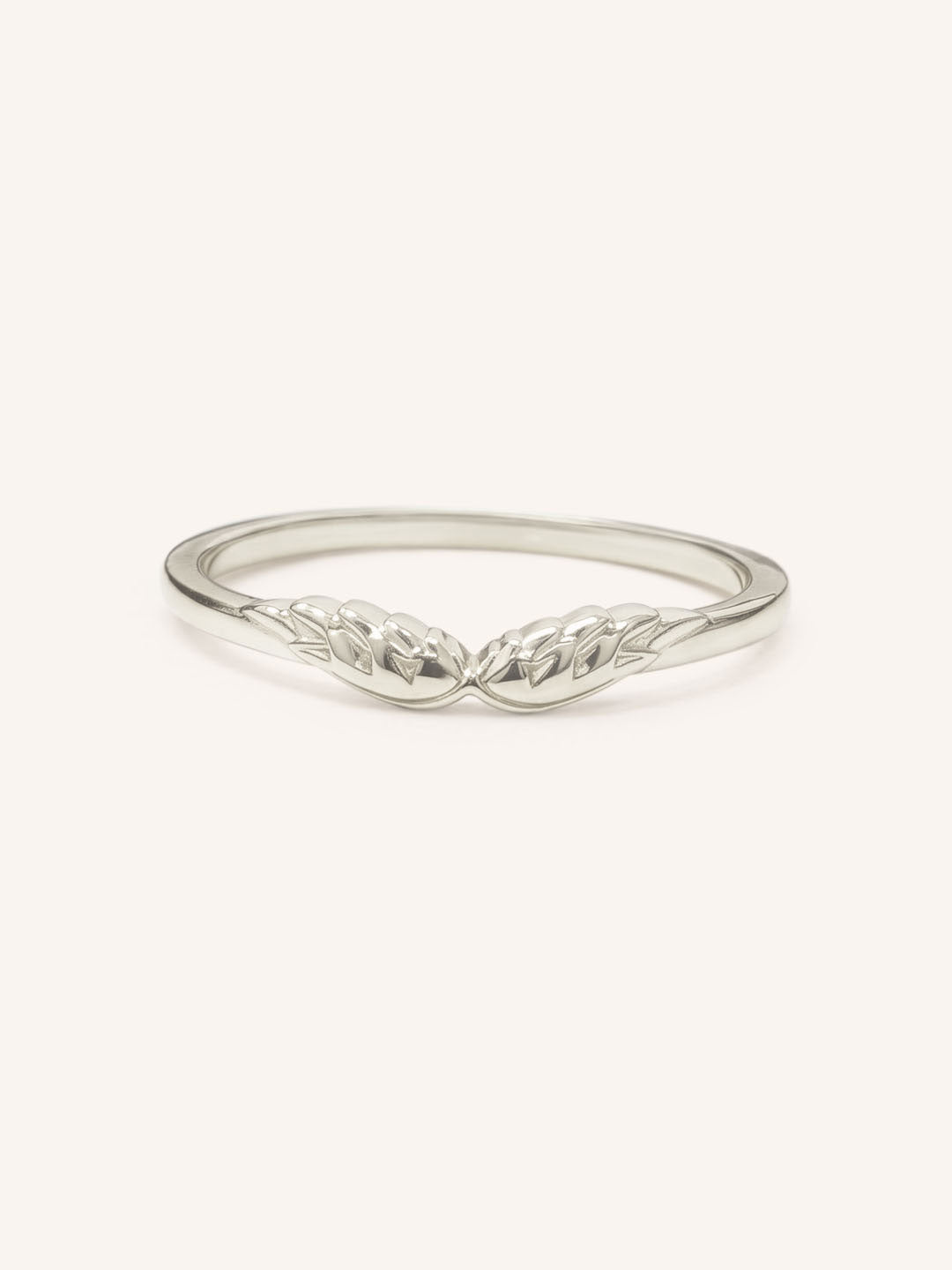 White gold Addison angel wings chevron stackable ring on white background