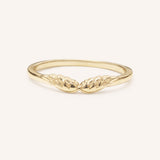 Yellow gold stackable ring with carved angel wings design, front view, on white background