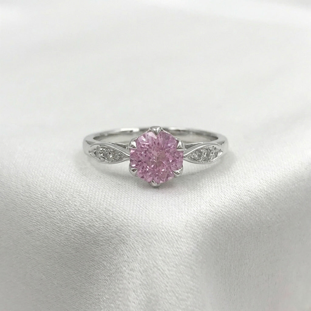 Pink sapphire diamonWhite gold Zamora curved diamond anniversary band front view on white backgroundd leaf ring on white background