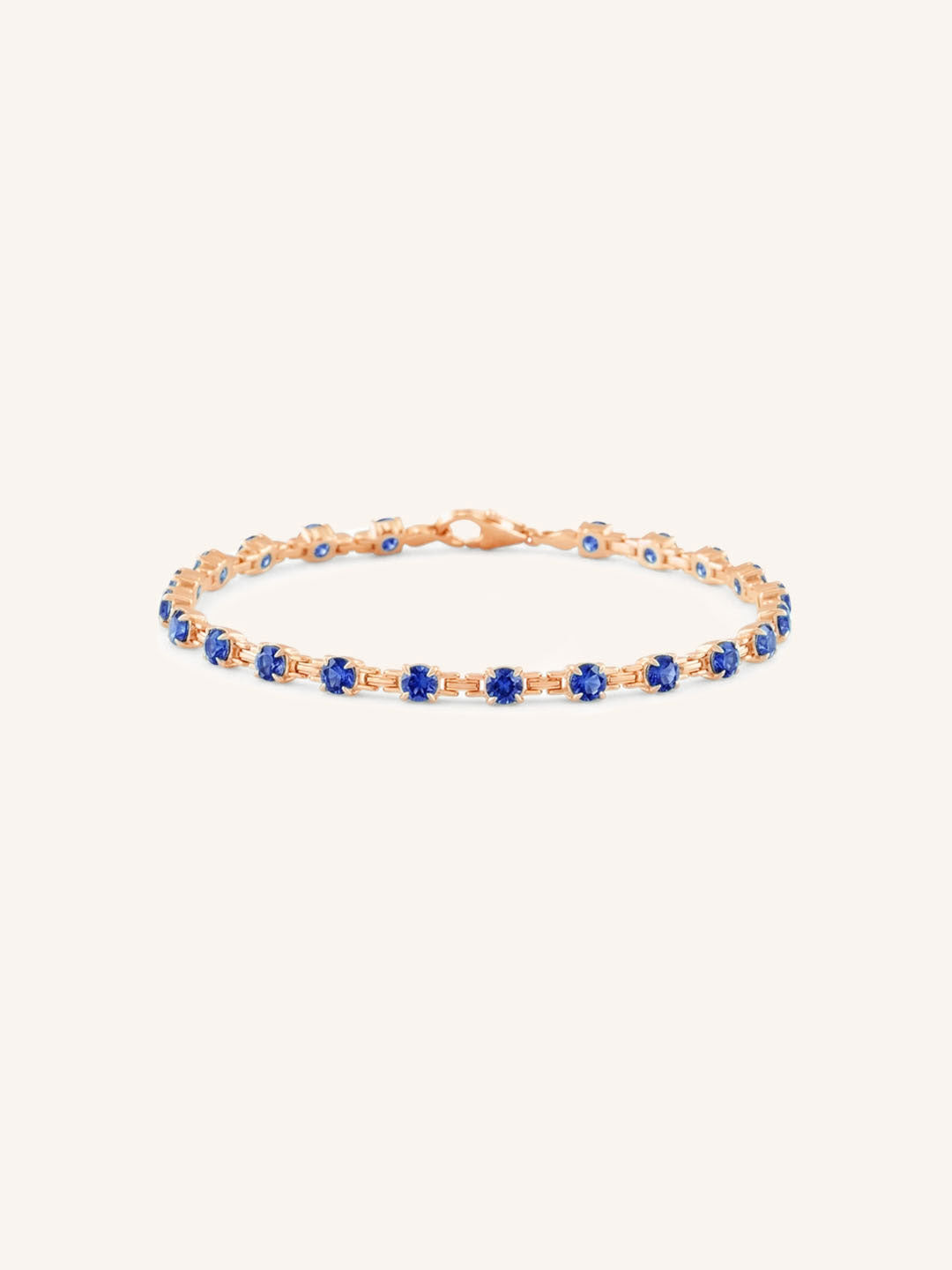 Rose Gold Evelyn Blue Sapphire Tennis Bracelet on white background