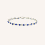 White Gold Evelyn Blue Sapphire Tennis Bracelet on white background