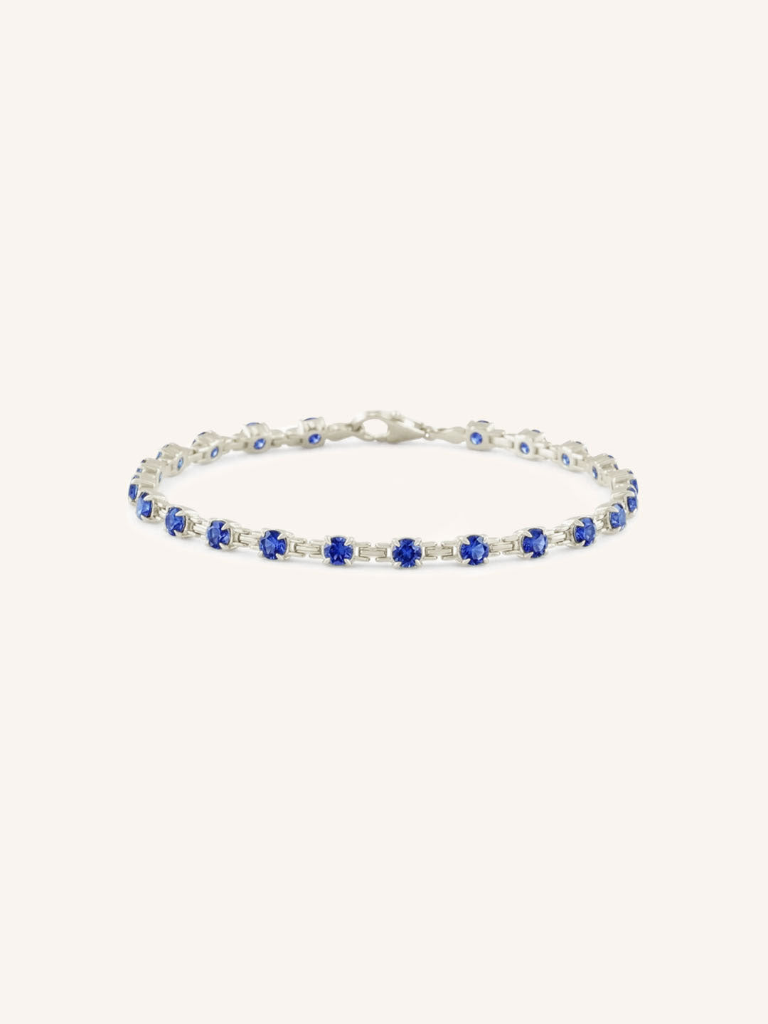 White Gold Evelyn Blue Sapphire Tennis Bracelet on white background