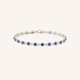 White Gold Evelyn Blue Sapphire Tennis Bracelet on white background