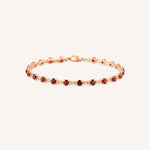 Rose Gold Evelyn Garnet Tennis Bracelet on white background