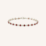 White Gold Evelyn Garnet Tennis Bracelet on white background