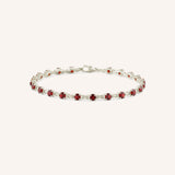 White Gold Evelyn Garnet Tennis Bracelet on white background
