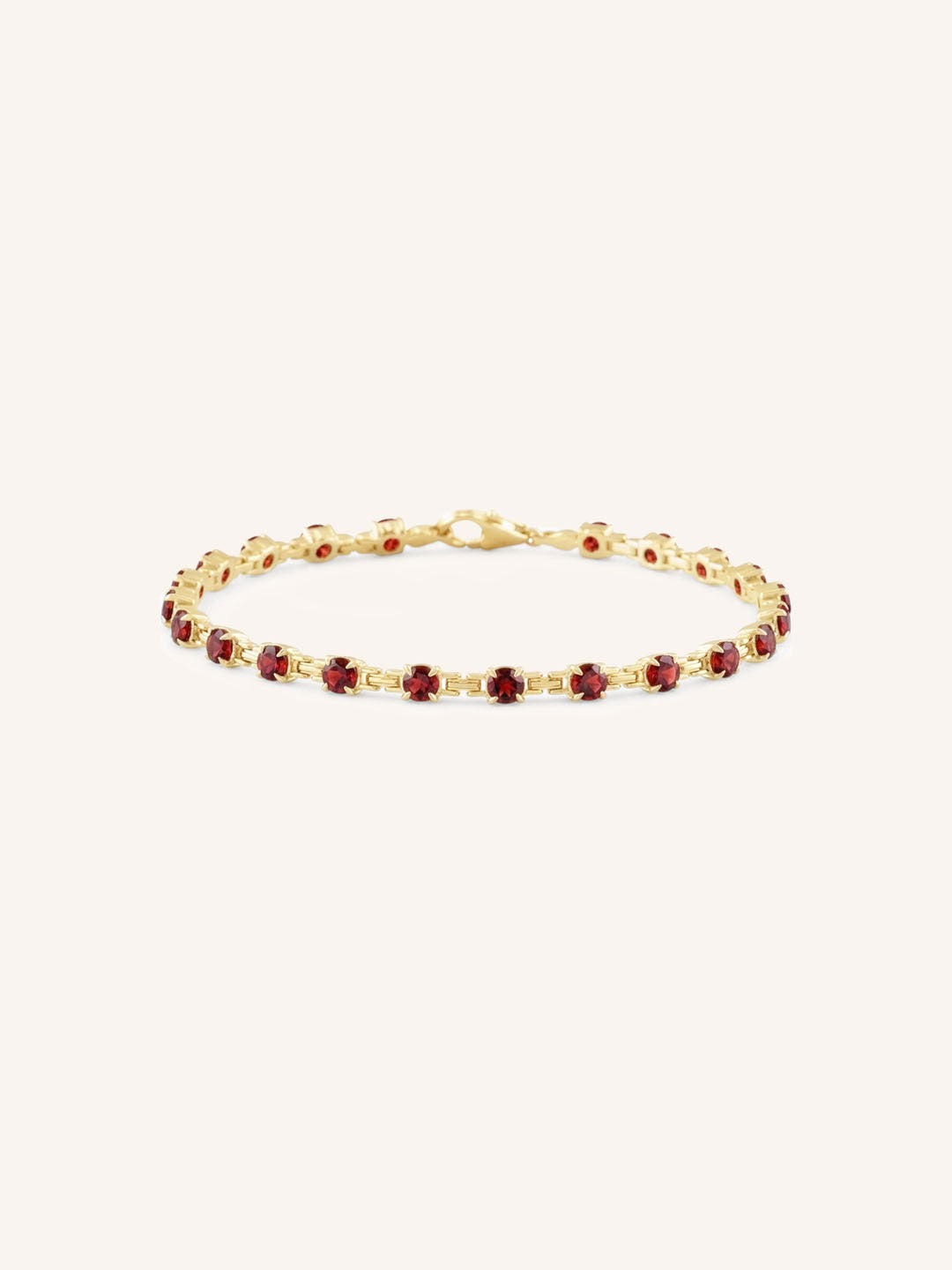 Yellow Gold Evelyn Garnet Tennis Bracelet on white background