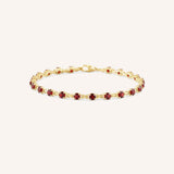 Yellow Gold Evelyn Garnet Tennis Bracelet on white background