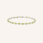 White Gold Evelyn Peridot Tennis Bracelet on white background