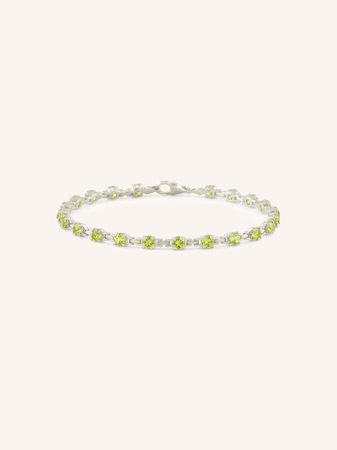 White Gold Evelyn Peridot Tennis Bracelet on white background