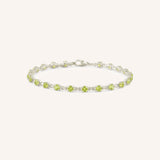 White Gold Evelyn Peridot Tennis Bracelet on white background