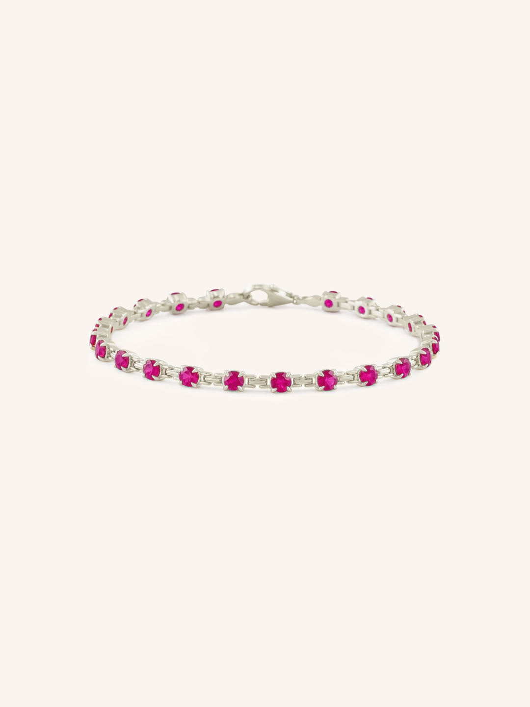 White Gold Evelyn Ruby Tennis Bracelet on white background