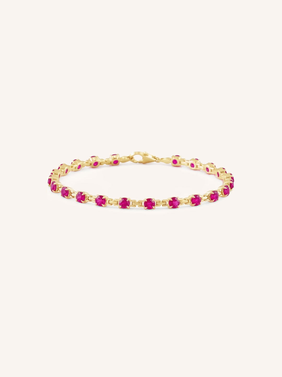 Yellow Gold Evelyn Ruby Tennis Bracelet on white background